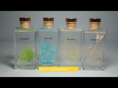 नकली फूलों की सजावट के साथ कस्टम प्राकृतिक रीड डिफ्यूज़र रूम परफ्यूम 200 मि.ली